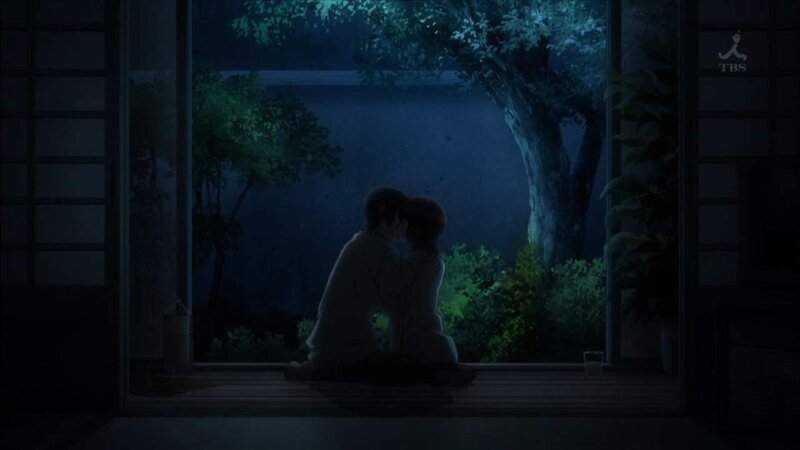 couple embracing at night