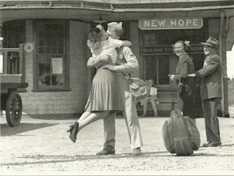 Couple Embracing at Station