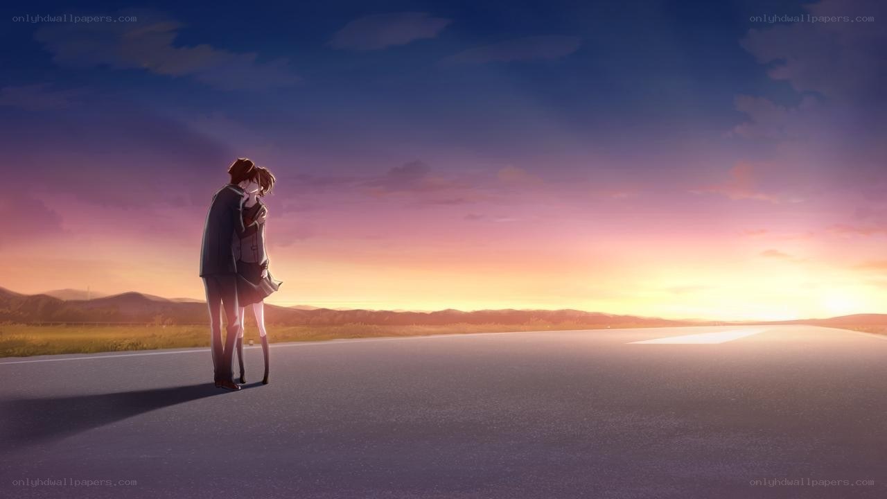 couple embracing at sunset