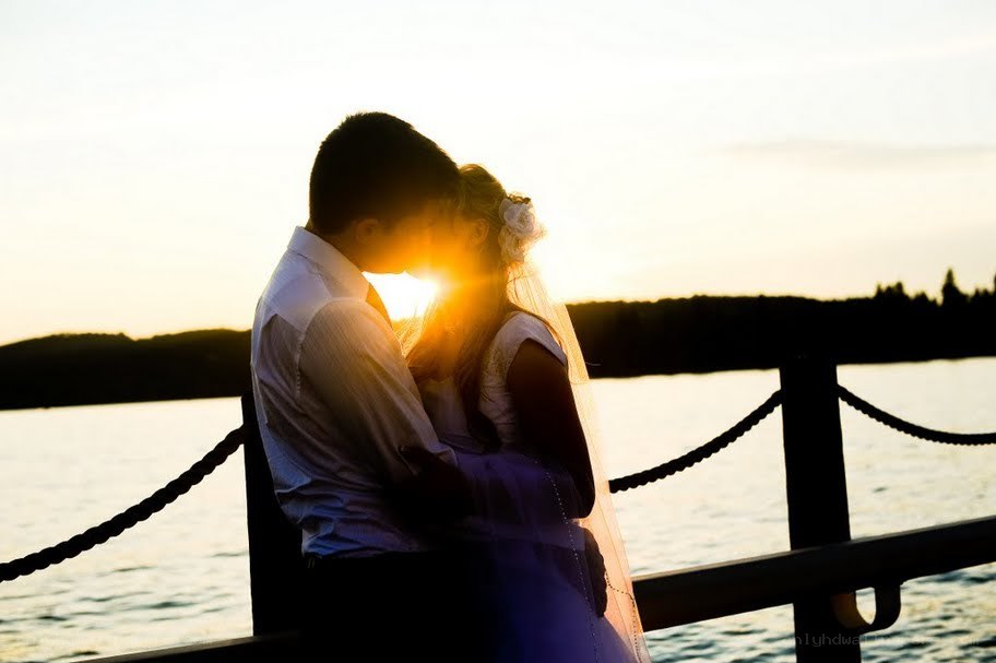 couple embracing at sunset