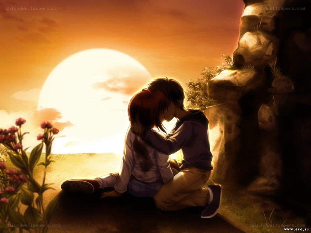 Couple embracing at sunset