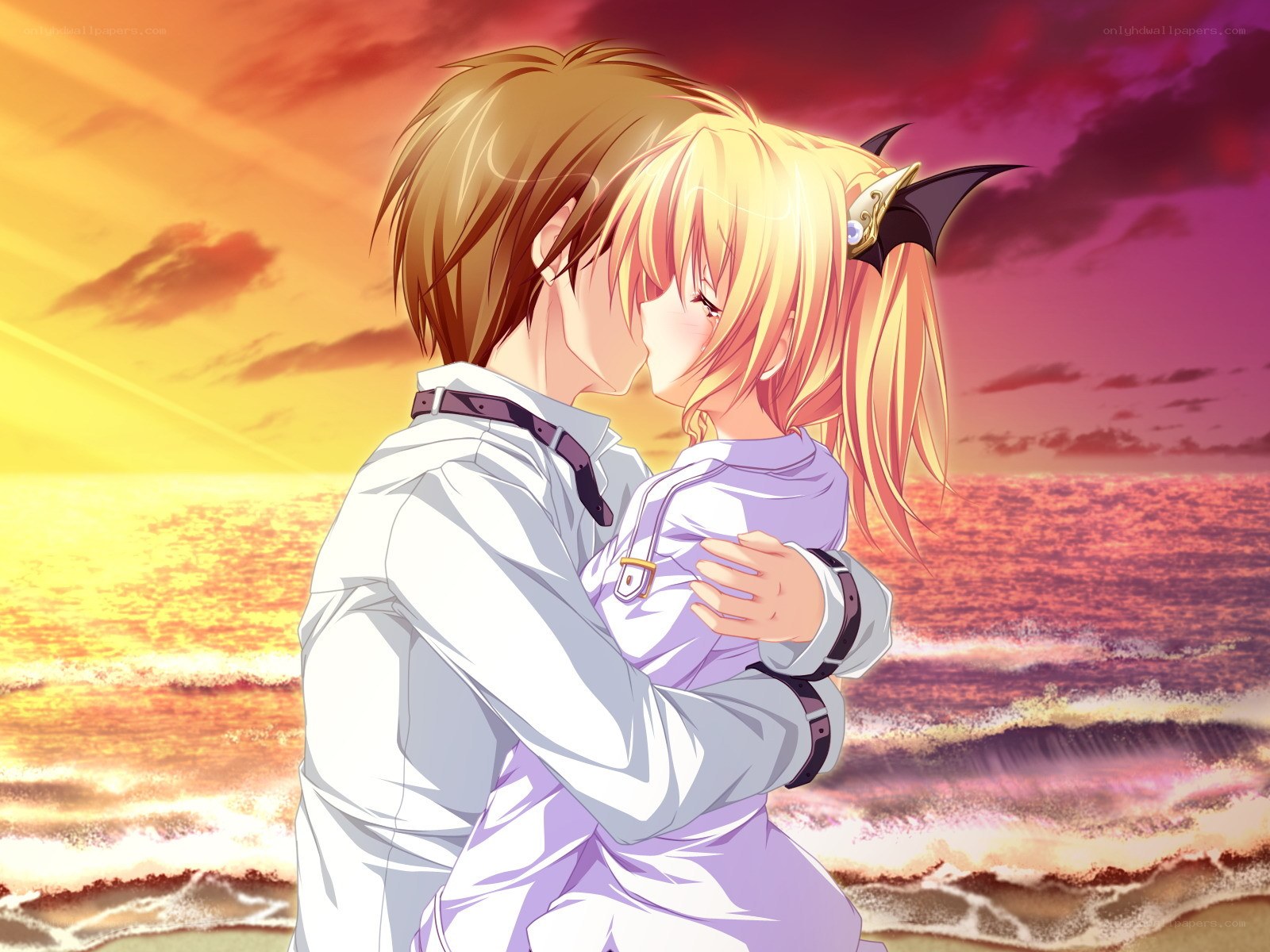 couple embracing at sunset