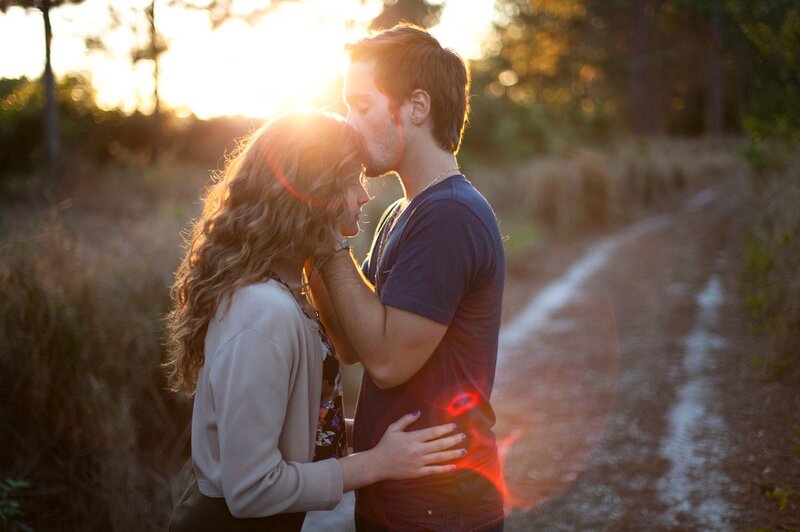 Couple Embracing at Sunset — Orange, Romantic