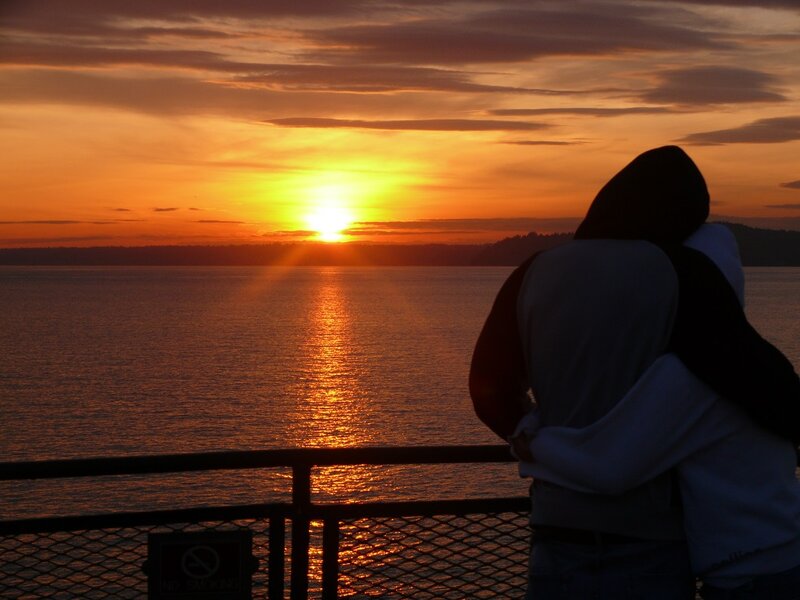 Couple Embracing at Sunset — Orange, Serene, Photograph