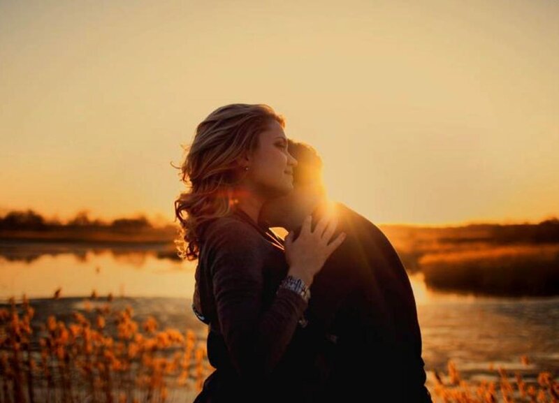 Couple Embracing at Sunset — Orange, Serene