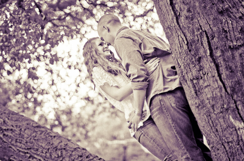 Couple Embracing by Tree