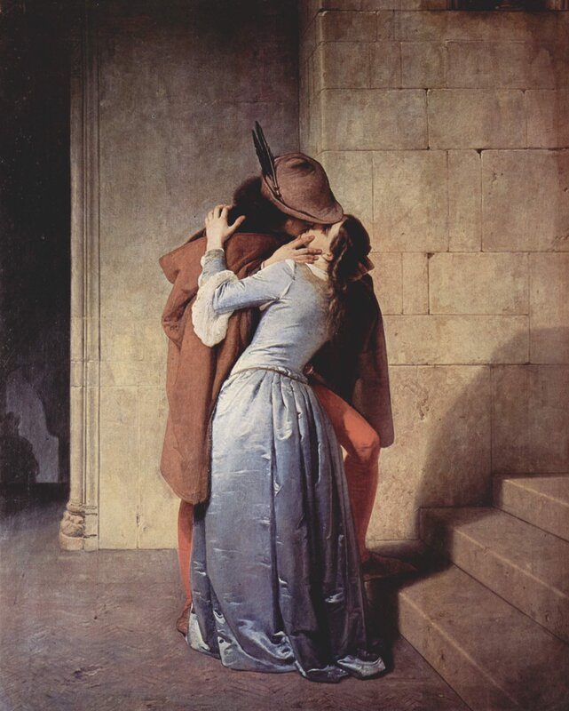 Couple embracing in a corner
