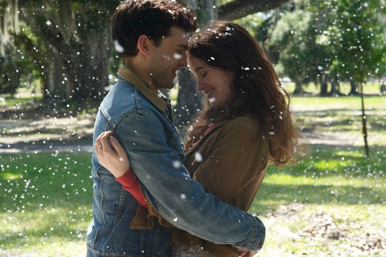 Couple embracing in a park