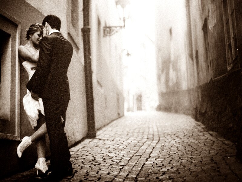 Couple Embracing in Alley — Black