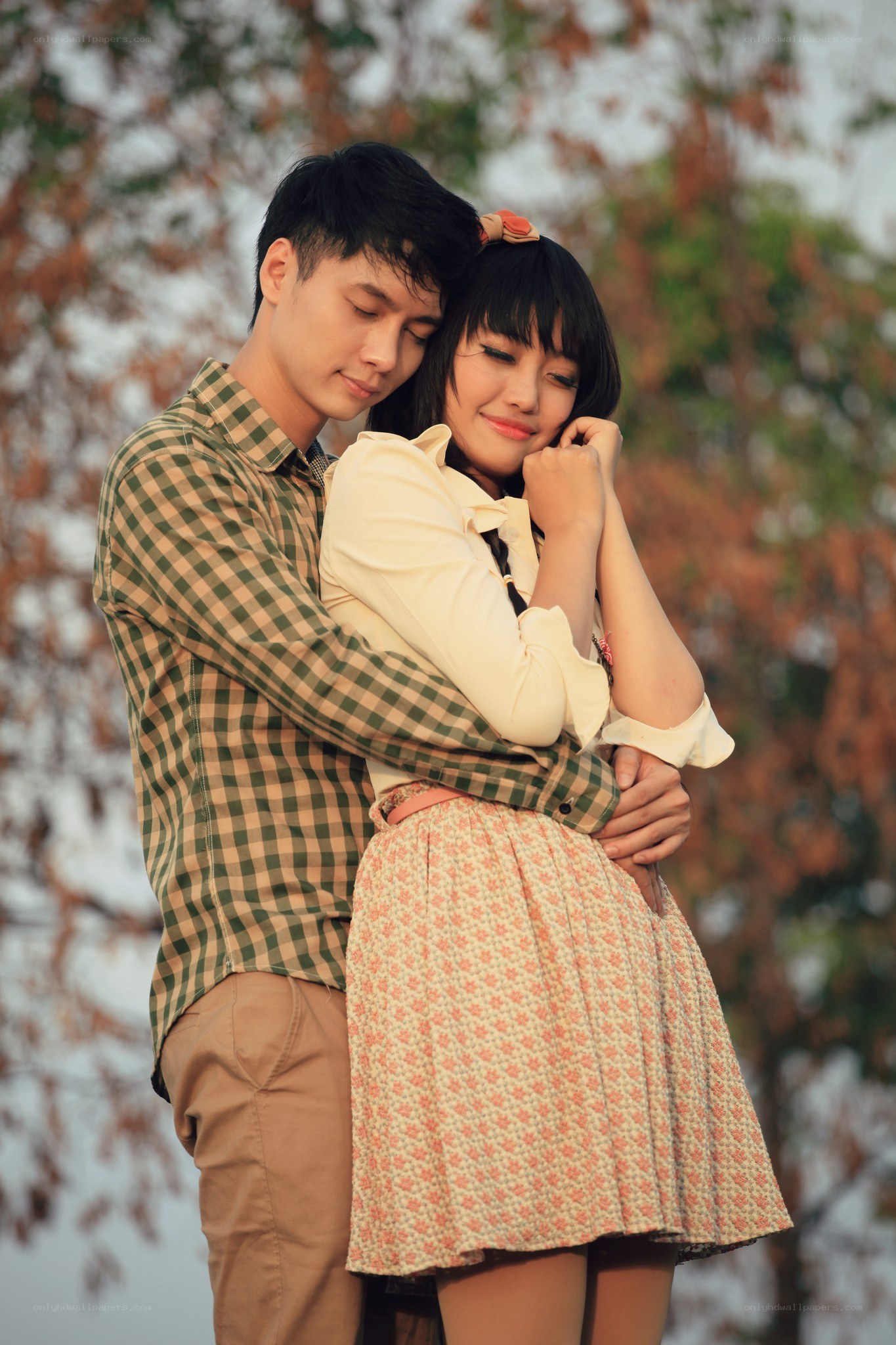 couple embracing in autumn