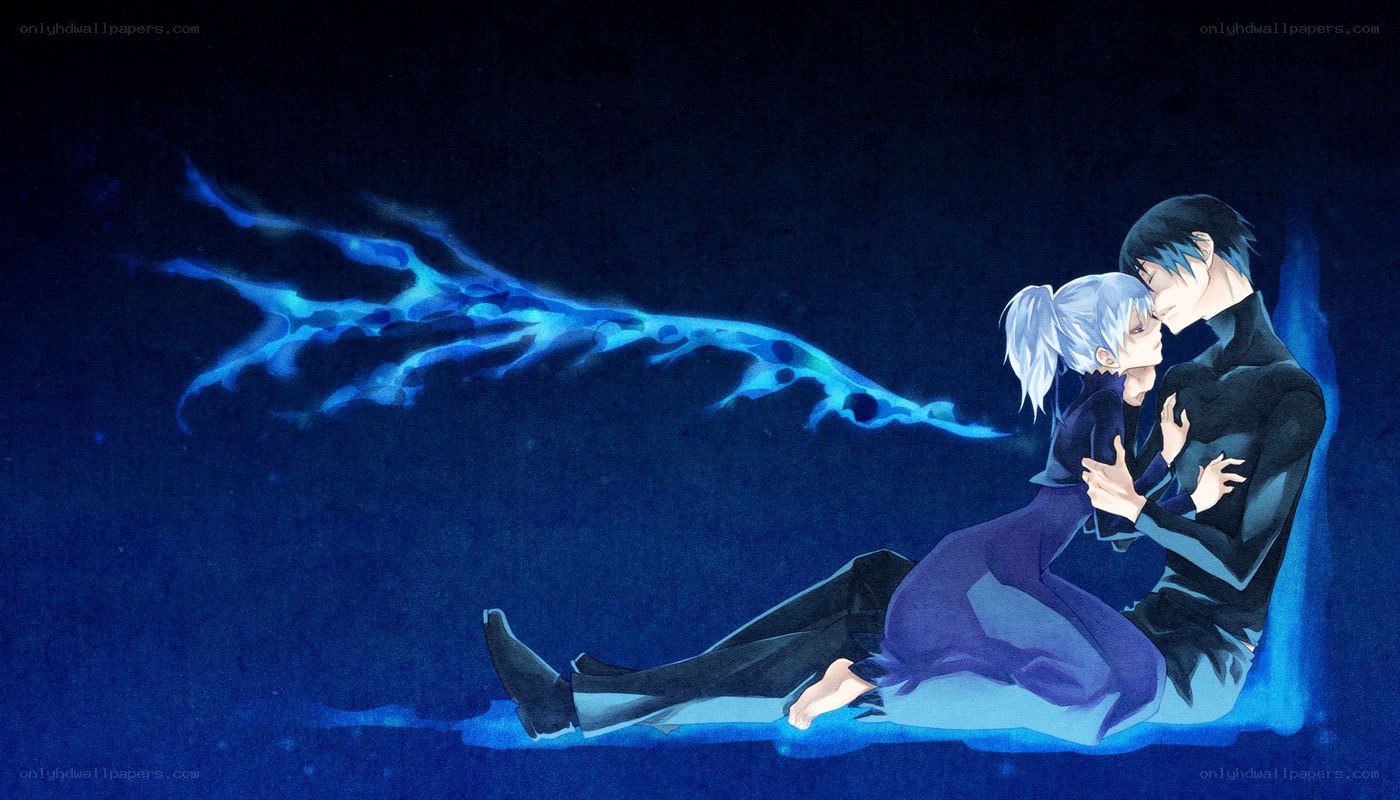 couple embracing in blue light