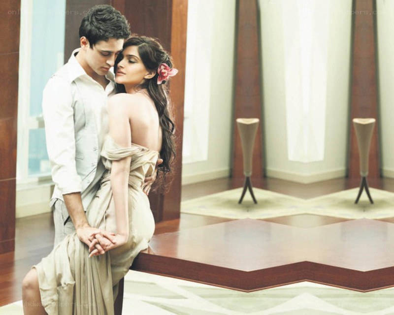 couple embracing in elegant room