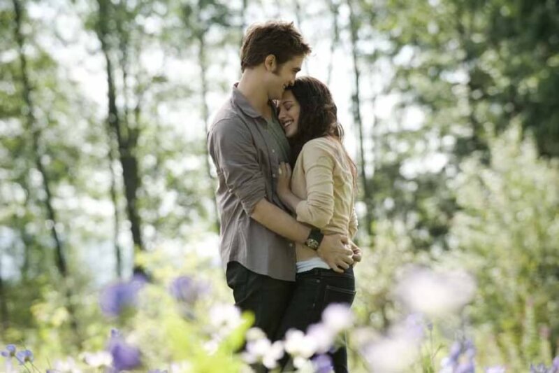 Couple Embracing in Field — Green