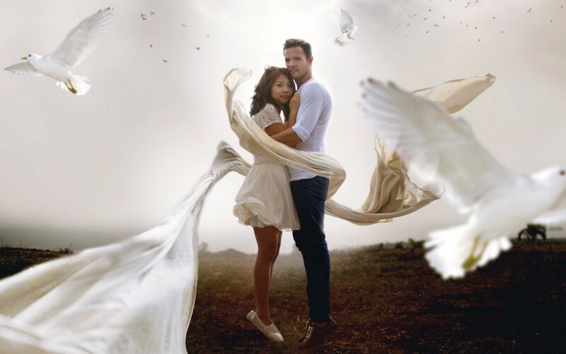 Couple Embracing in Field — White, Serene