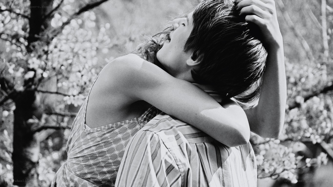 couple embracing in garden
