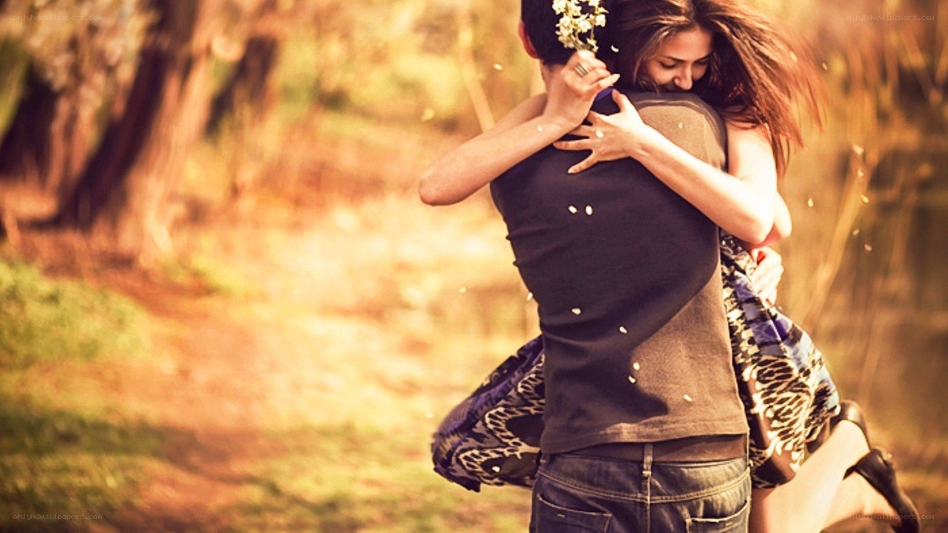 couple embracing in park
