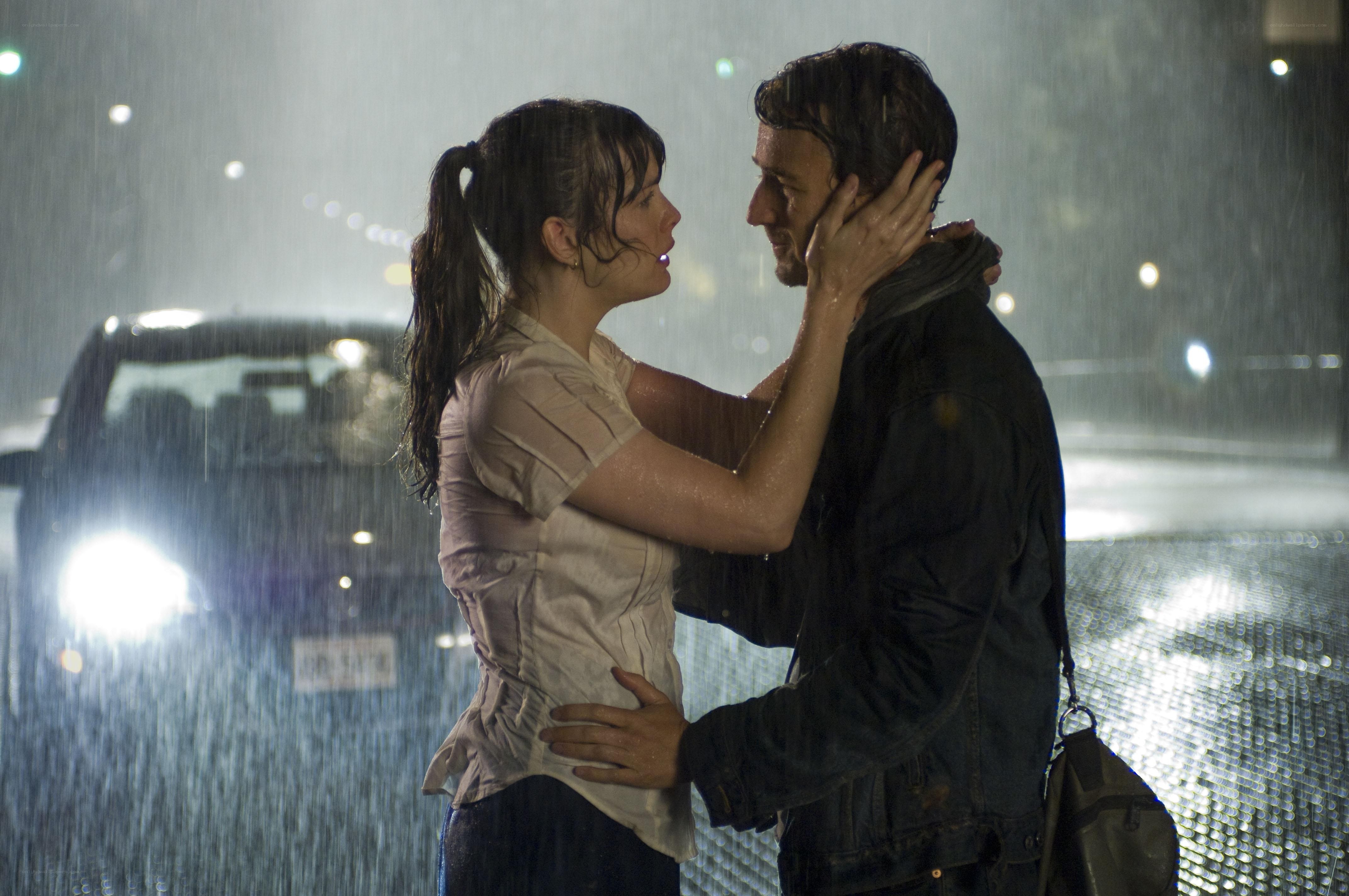 couple embracing in rain