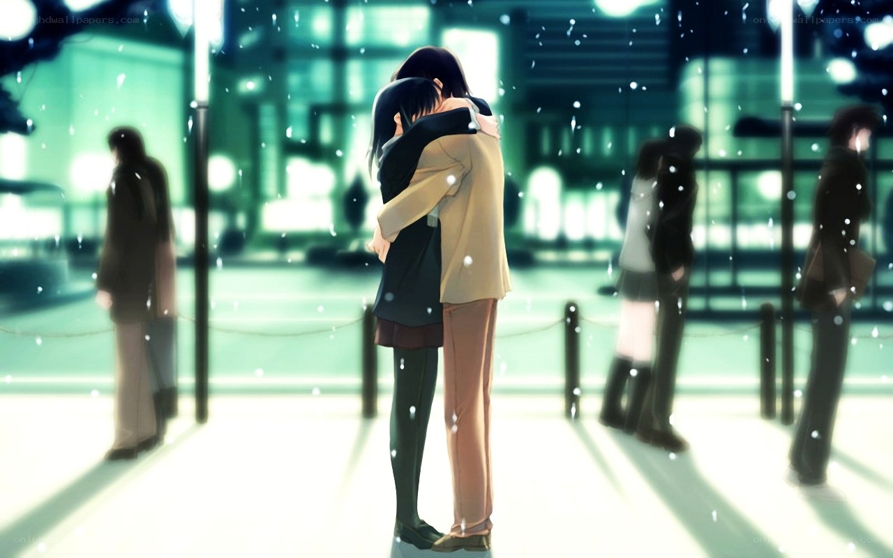 couple embracing in snow