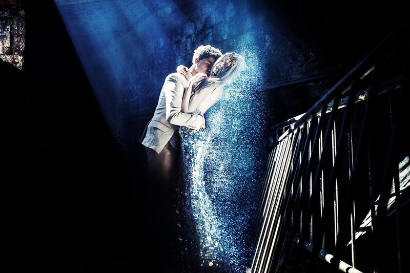 Couple Embracing in Water — Blue, Dramatic