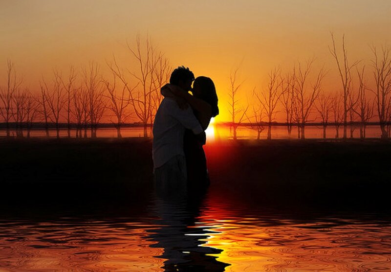 Couple Embracing in Water — Orange, Romantic