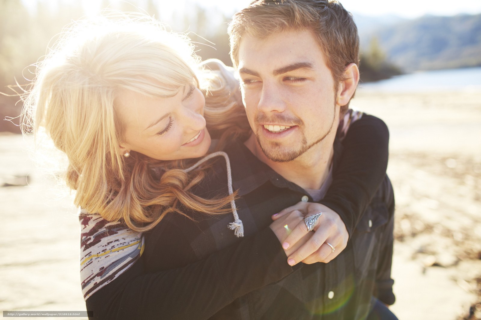 Couple embracing on beach