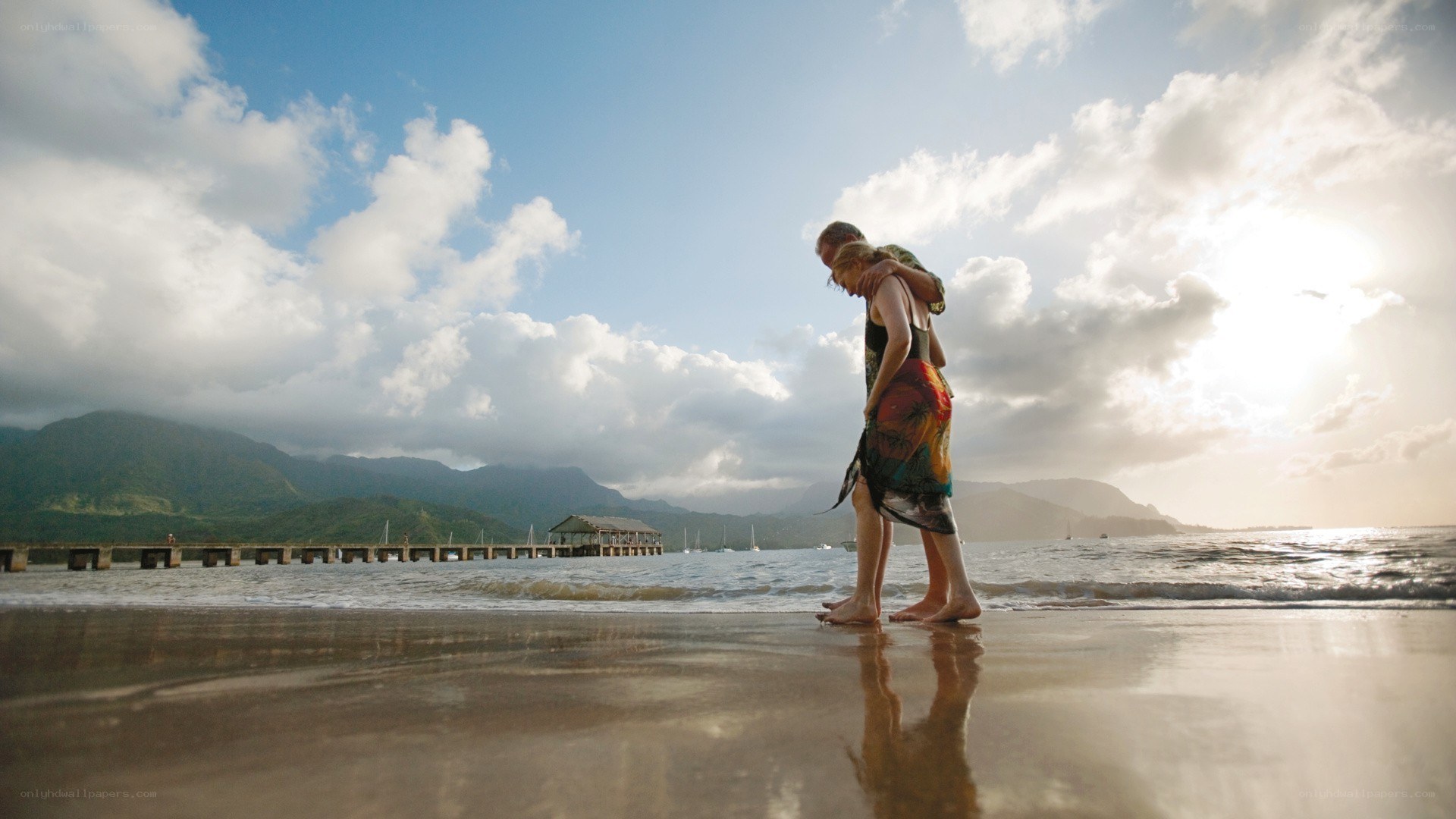Couple embracing on beach