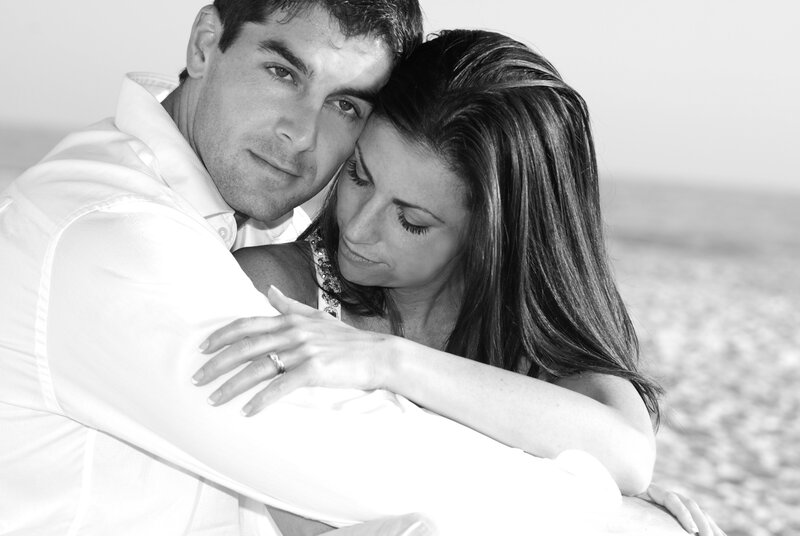 Couple Embracing on Beach — Black, Intimate