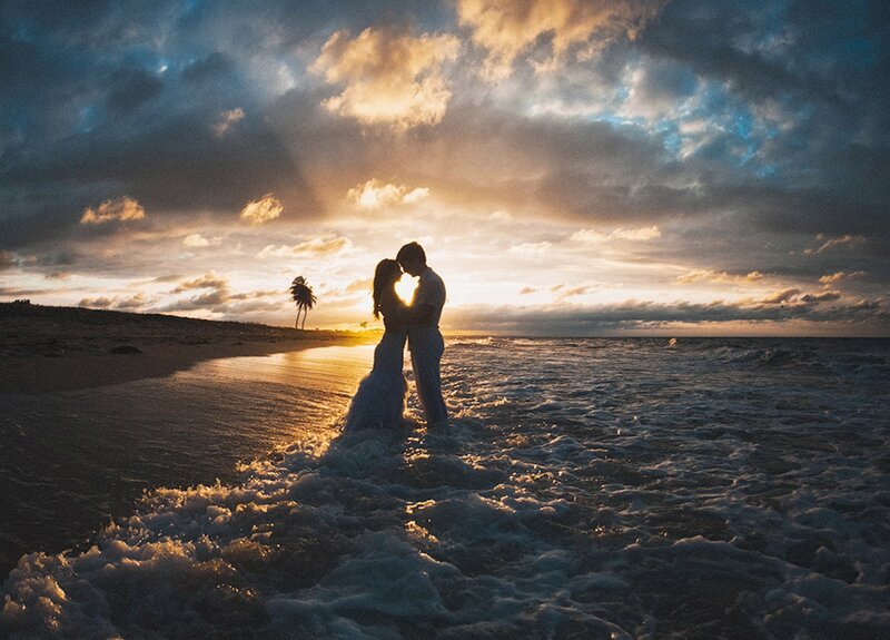 Couple Embracing on Beach — Blue, Dramatic, Sunset, Photograph