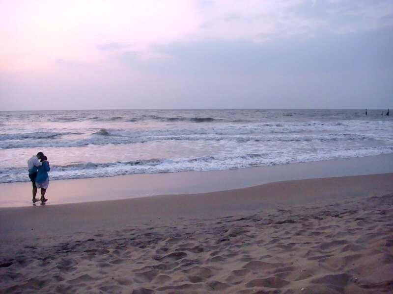 Couple Embracing on Beach — Pink, Serene