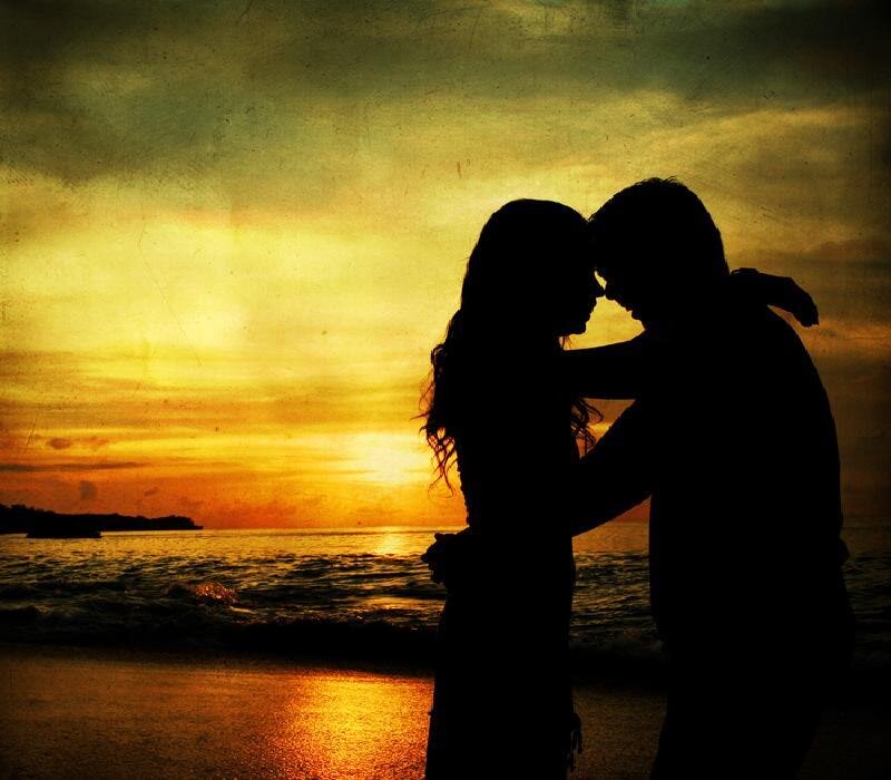 Couple Embracing on Beach — Yellow, Romantic, Sunset, Photograph