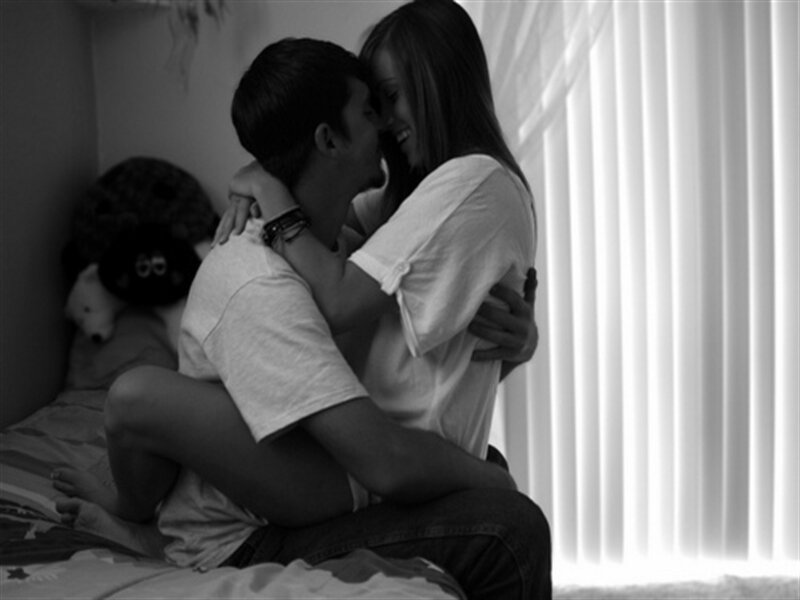 Couple Embracing on Bed — Black