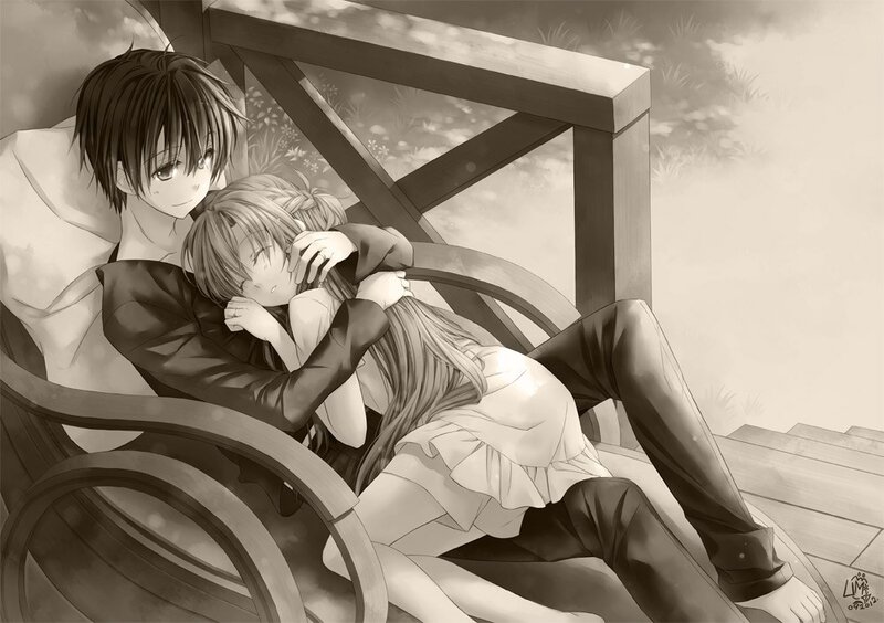 couple embracing on bench