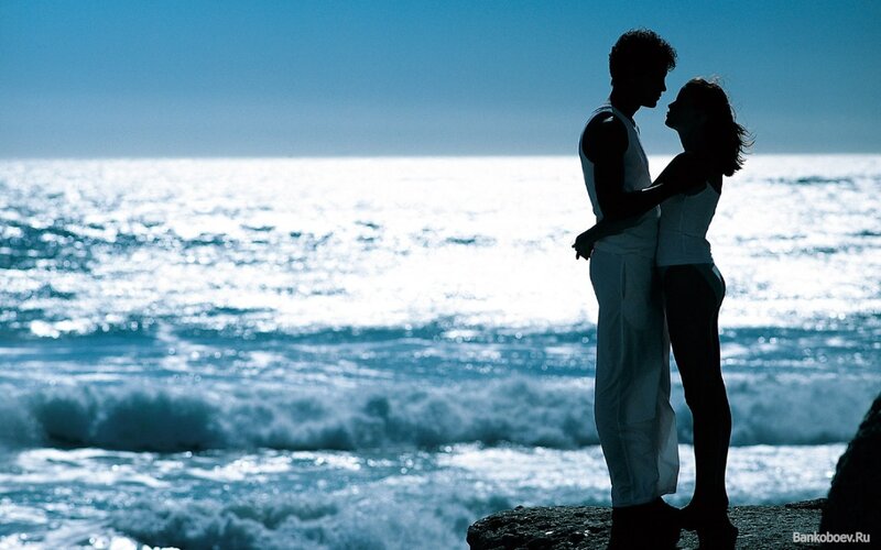 Couple Embracing on Cliff — Blue, Serene