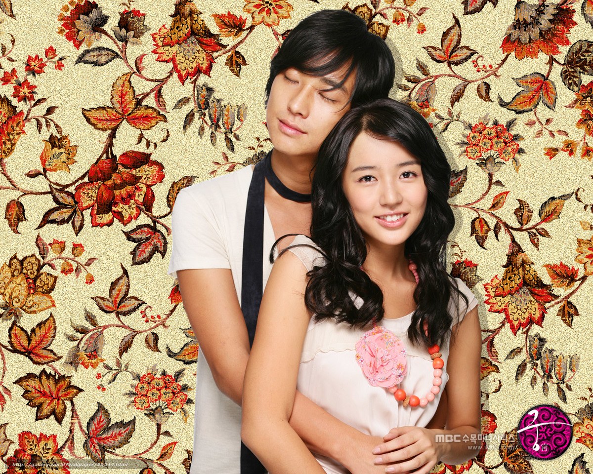 couple embracing on floral background