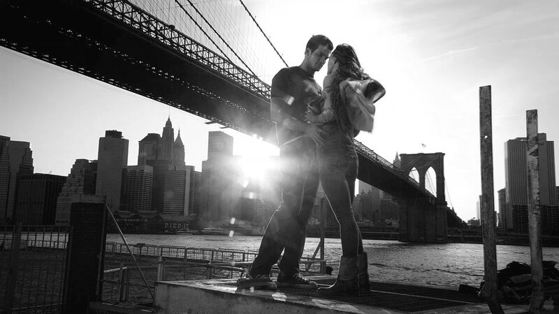 Couple Embracing on Pier — Black