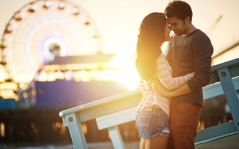 Couple Embracing on Pier — Gold