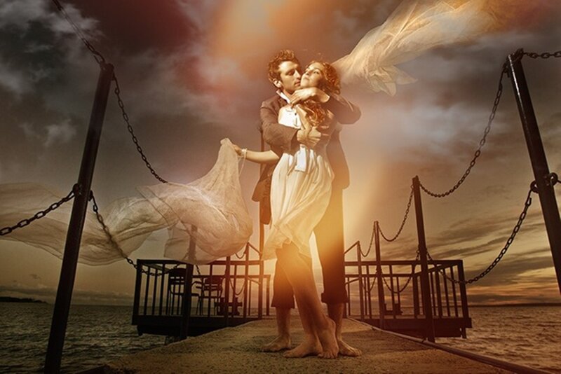 Couple Embracing on Pier