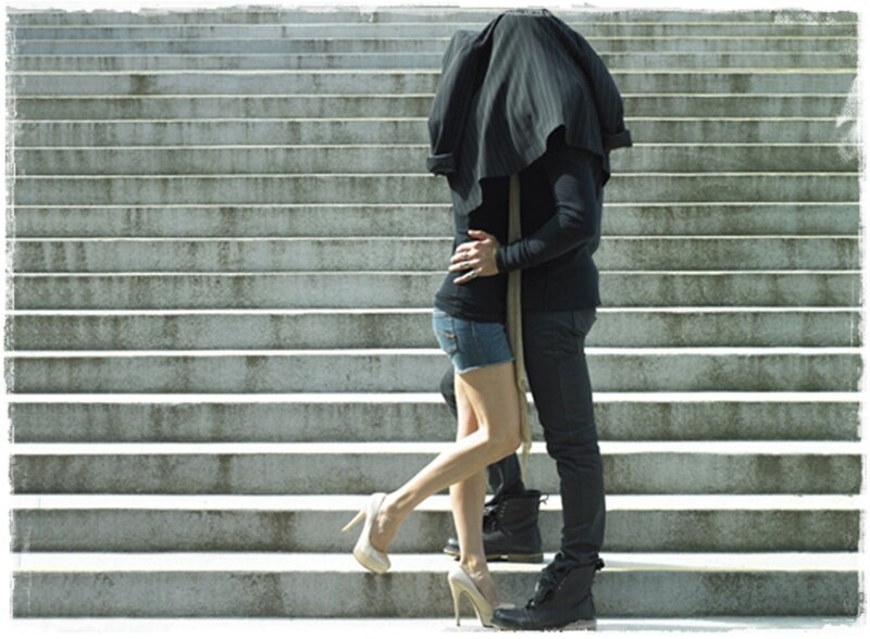 Couple Embracing on Stairs — Gray