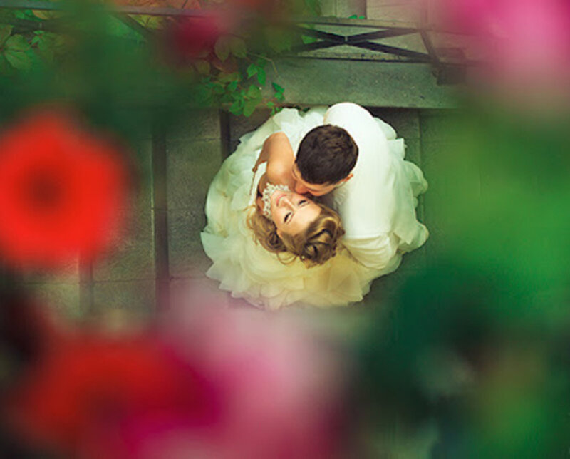 Couple Embracing on Stairs — White
