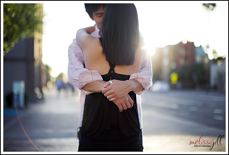 Couple Embracing on Street — Black