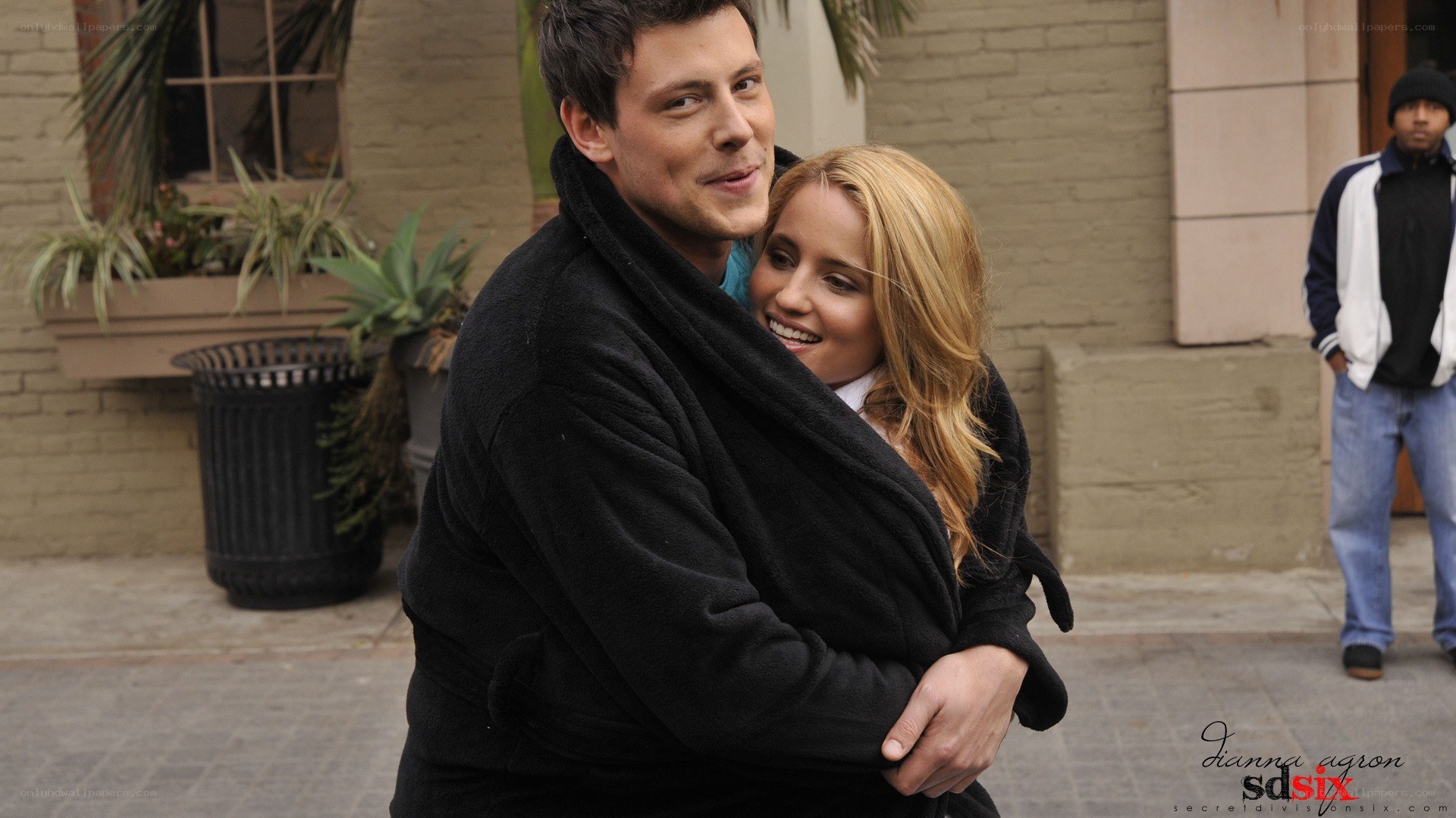 couple embracing on street