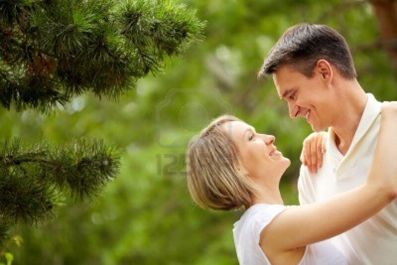 Couple Embracing Outdoors — Green, Romantic
