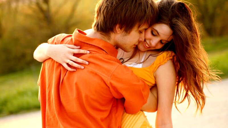 Couple Embracing Outdoors — Orange, Intimate, Sunset