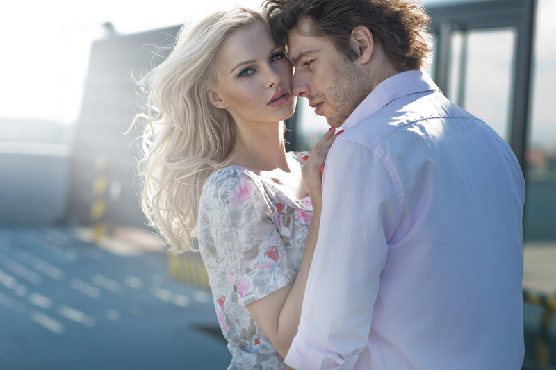 Couple Embracing Outdoors — White