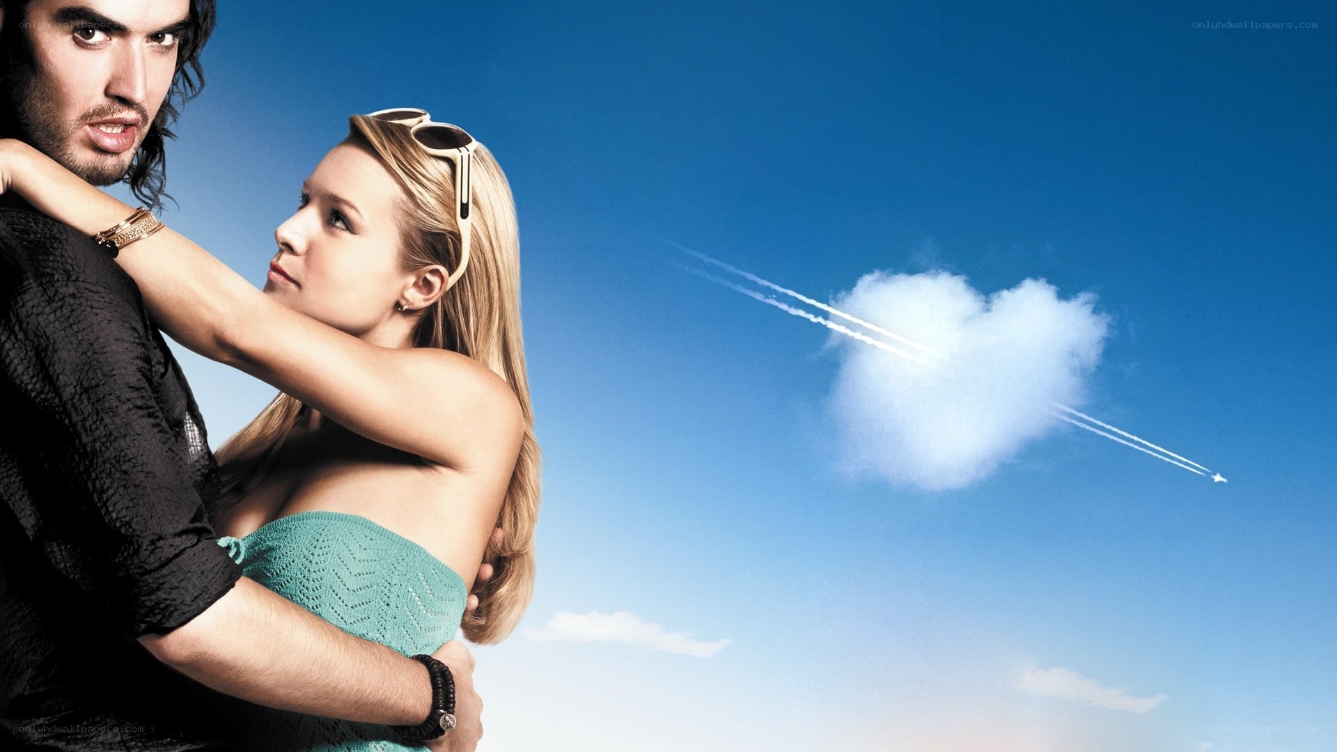 Couple embracing under blue sky