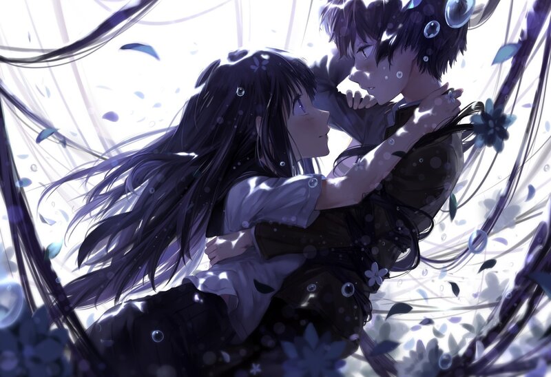 Couple Embracing Underwater