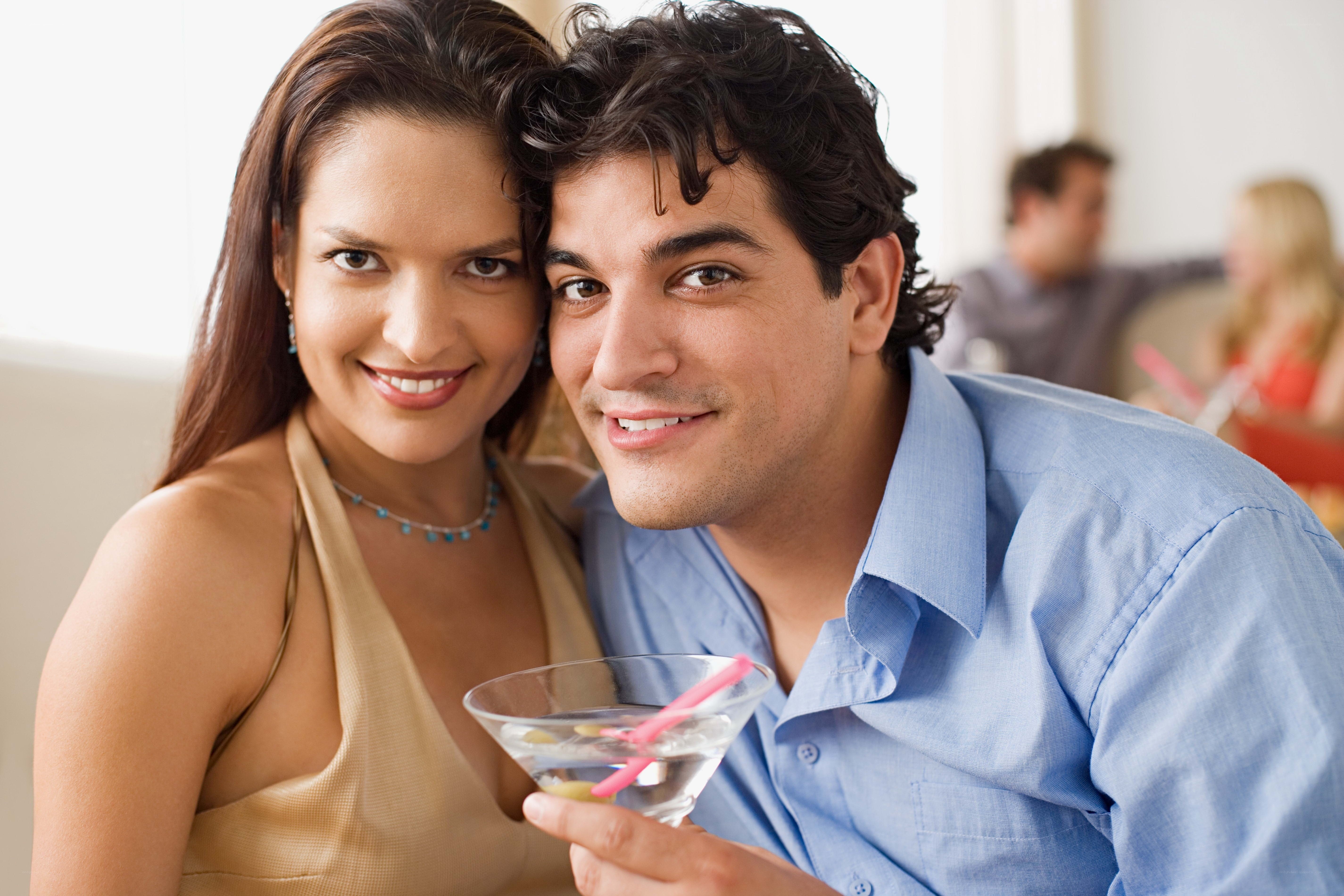 Couple enjoying cocktails
