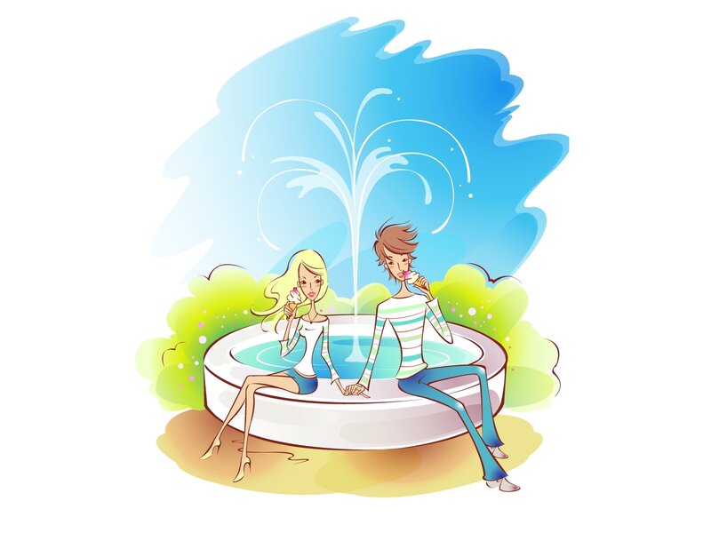 Couple enjoying ice cream by fountain