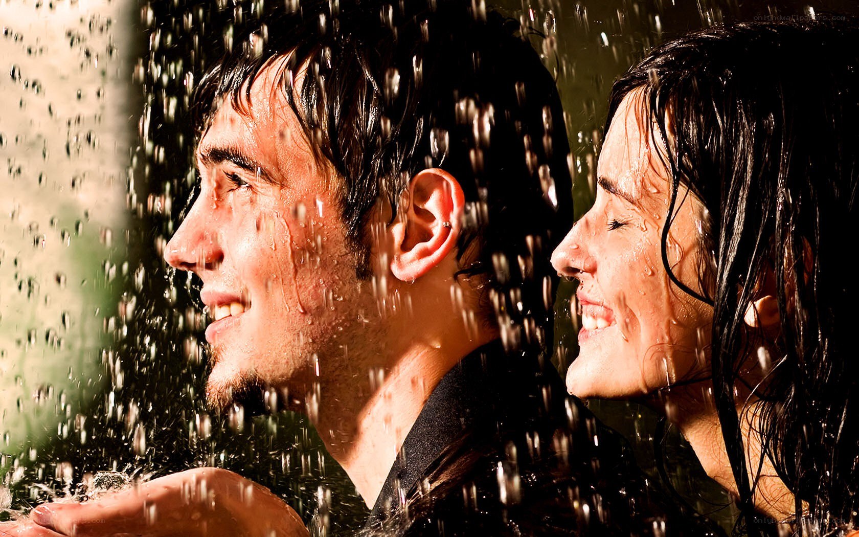 couple enjoying rain shower