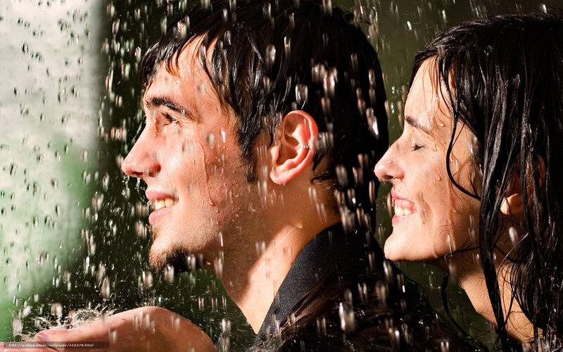 couple enjoying rain shower